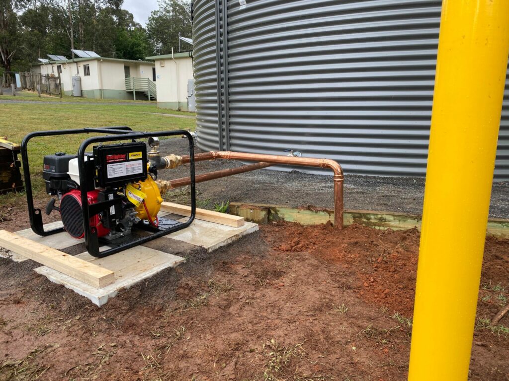 Water-tank-and-pump-installed-at-Camp-Marysville